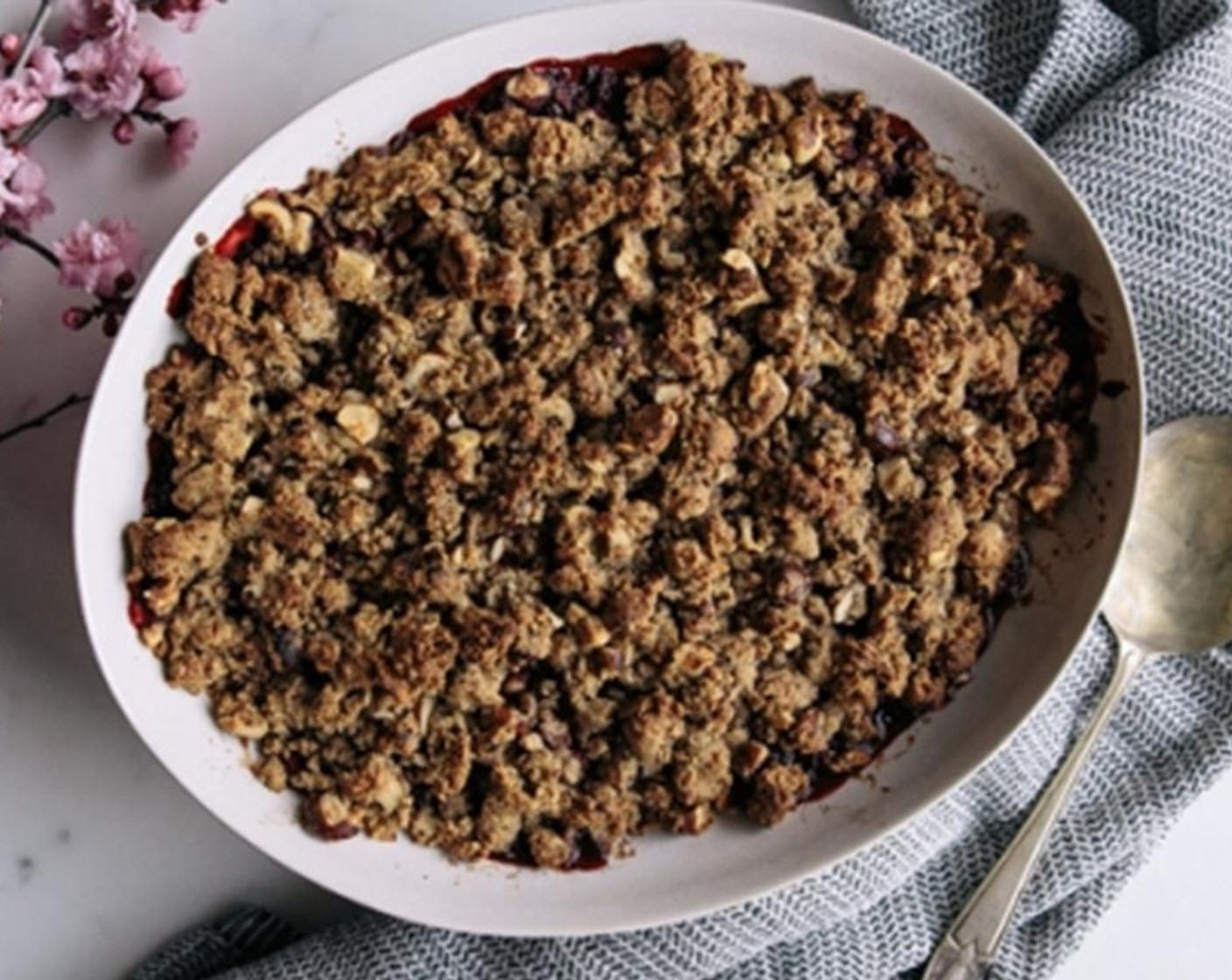 step 7 Once cooked, take the crumble from the oven and let it cool for 5 minutes.