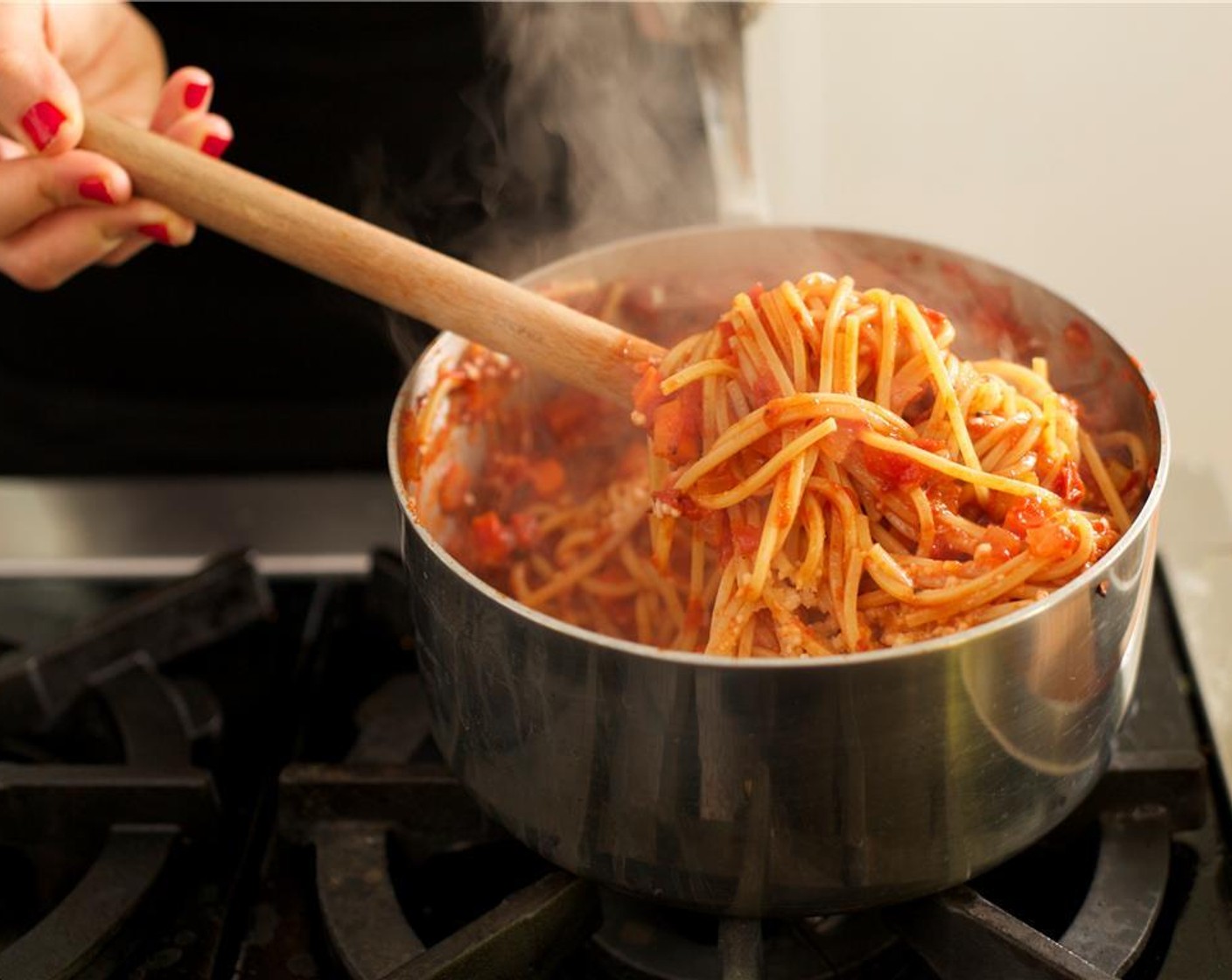 step 14 Add the pasta to the pot with the sauce, add two tablespoons of Parmesan Cheese (1/2 cup) and the cooked pancetta. Toss until well incorporated.