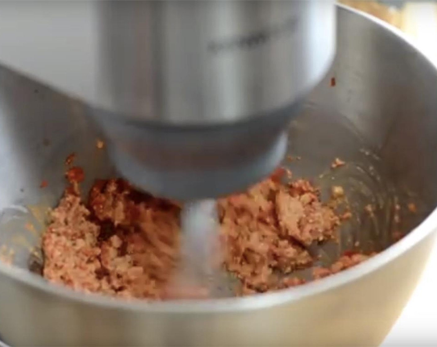 step 3 Add 3 tablespoons of the bell pepper mixture into a stand mixer, food processor or mixing bowl. Add Breadcrumbs (1 cup), Paprika (1 tsp), Ground Cumin (1 tsp), Pomegranate Molasses (3 Tbsp) and Olive Oil (1/4 cup). Add the Water (1/2 cup) gradually to achieve your desired consistency.
