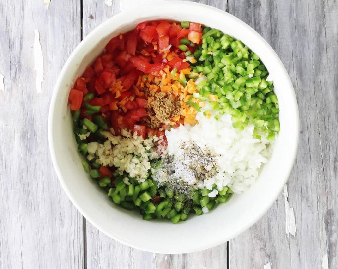 step 1 Combine Tomatoes (3 cups), Onion (1 cup), Green Bell Pepper (1/2 cup), Jalapeño Pepper (1), Habanero Pepper (1), Fresh Cilantro (1/3 cup), Garlic (4 cloves), Limes (1 1/2), Sea Salt (1/2 tsp), Ground Black Pepper (1/2 tsp), Ground Cumin (1/4 tsp).