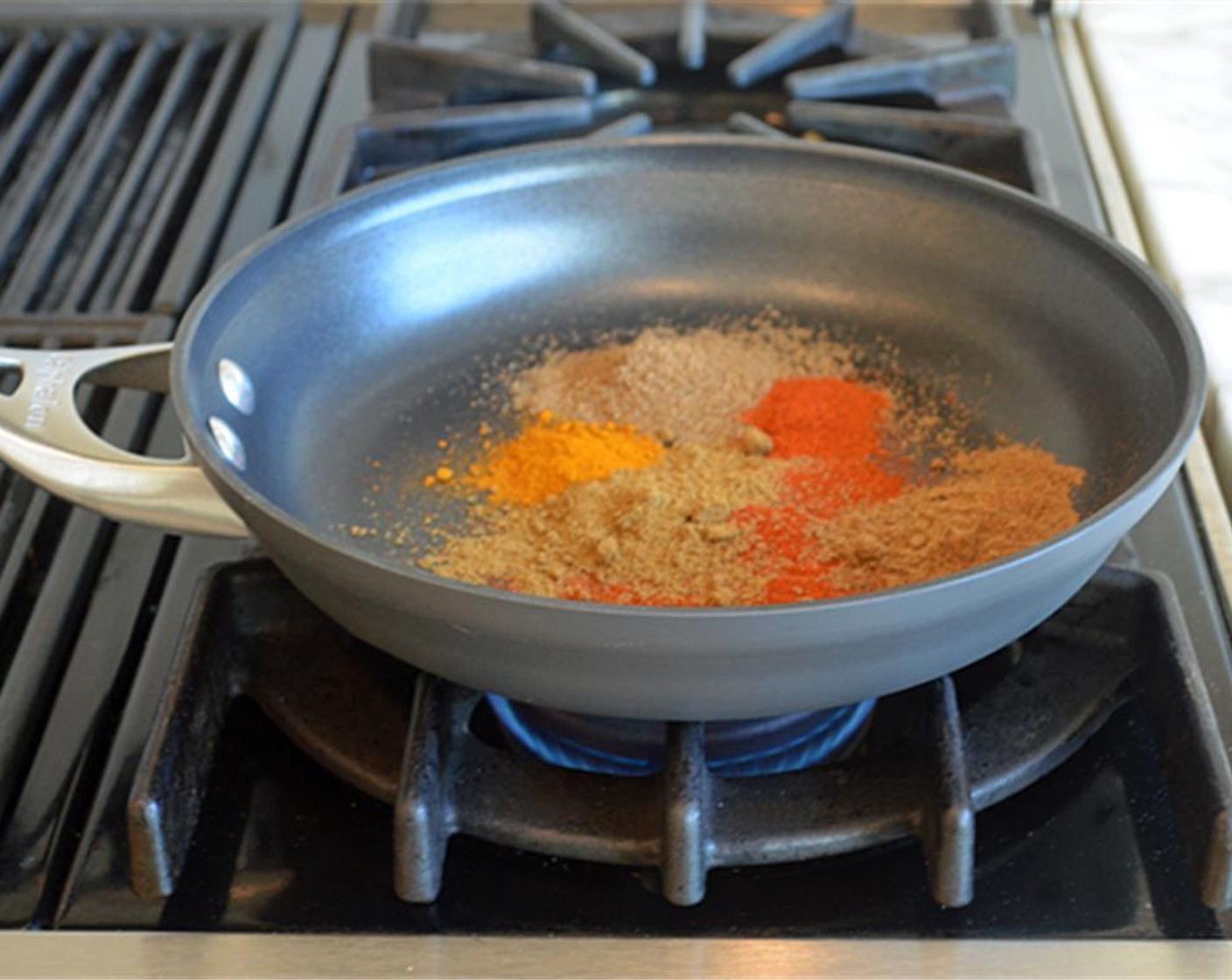 step 2 In a small pan over medium-low heat, combine the Paprika (1 Tbsp), Garam Masala (1 Tbsp), Ground Cumin (1 Tbsp), Ground Coriander (1 Tbsp), Ground Turmeric (1/2 tsp) and Cayenne Pepper (1/2 tsp).
