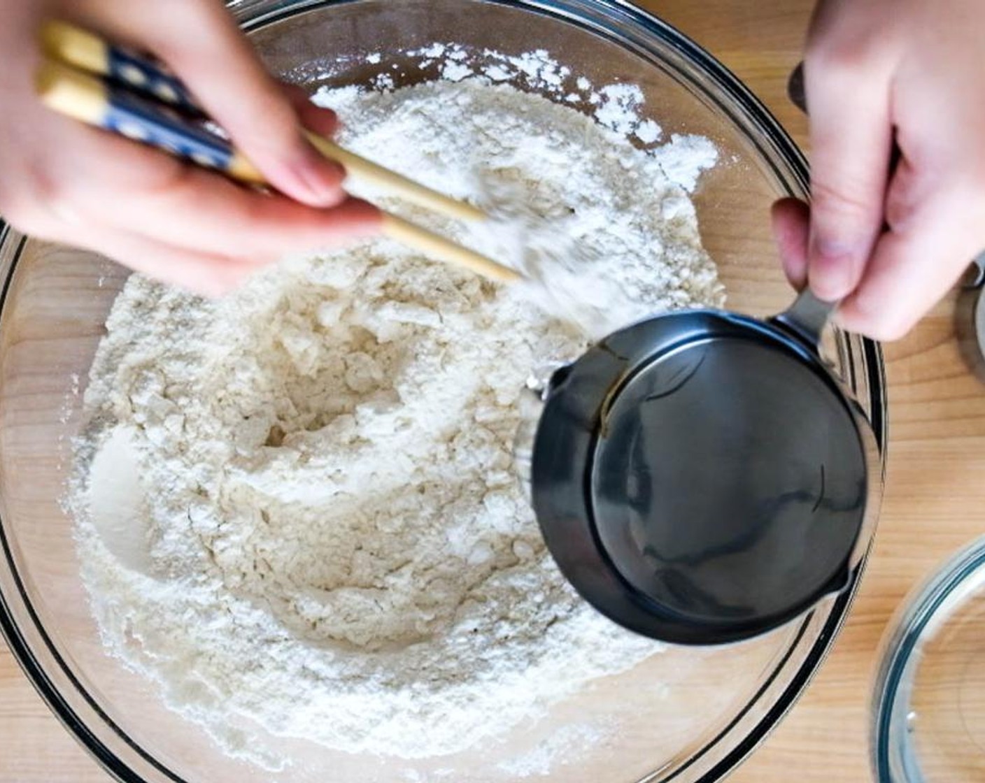 step 1 Combine All-Purpose Flour (2 cups) and Pastry Flour (1 cup). To make the dough, place 2 1/2 cup of the flour in a medium work bowl. Slowly pour in boiling Water (1 cup) while stirring clockwise with a pair of chopsticks until large flakes have formed.