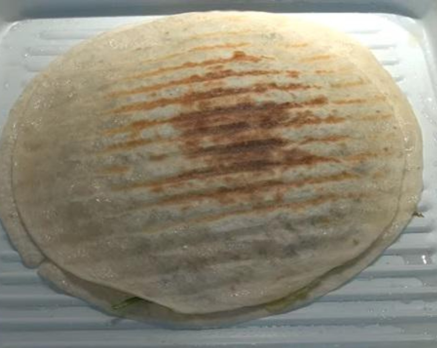 step 4 Use a regular frying pan with some oil in it, and separately cook each tortilla sandwich for 2 minutes each side.