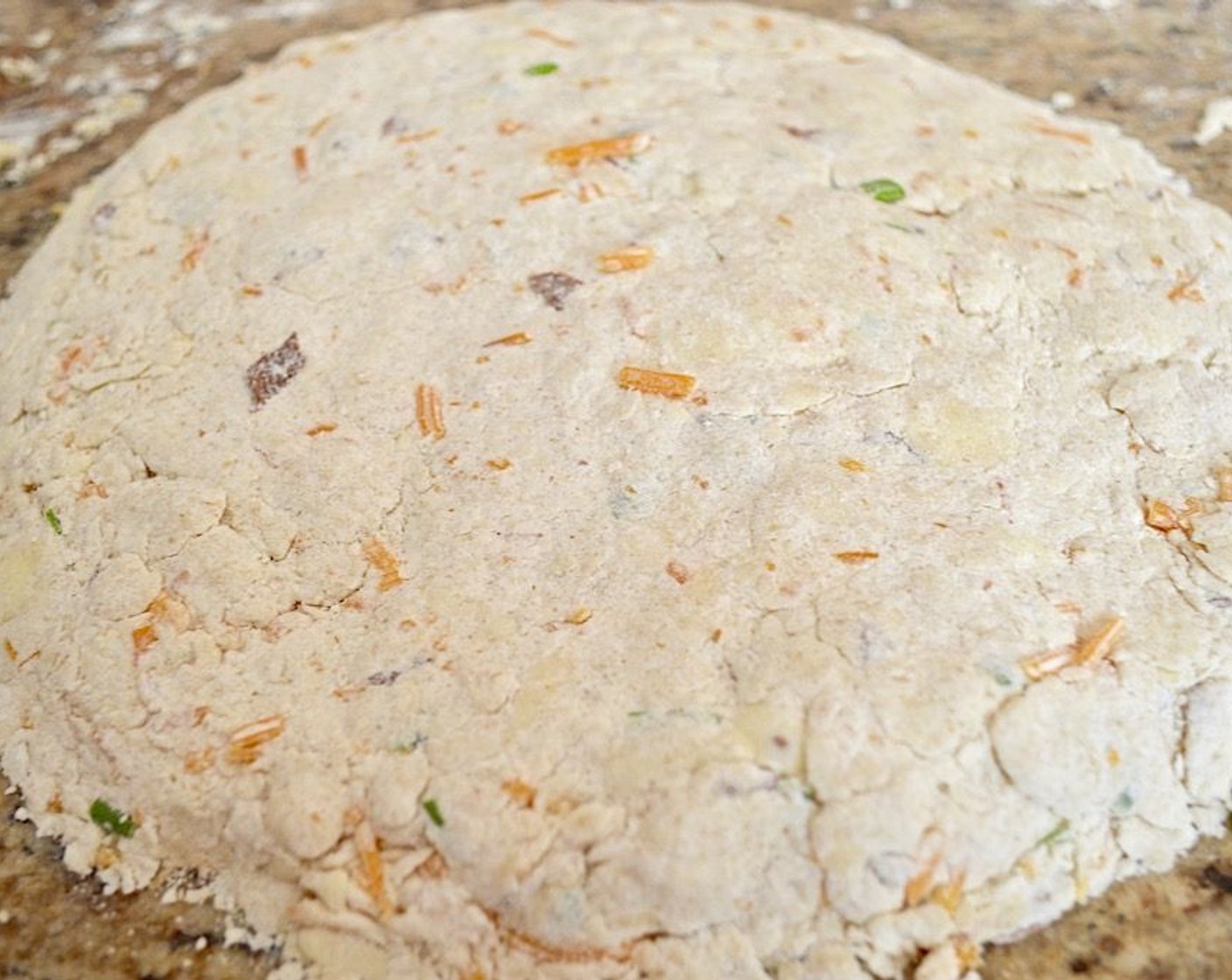 step 4 Put the bowl in the freezer for 15 minutes to chill it again. When the time is up, stir in the crumbled bacon, Fresh Chives (3 Tbsp), and Plain Greek Yogurt (1 cup) to bring it together. It will be really shaggy and that is ok.