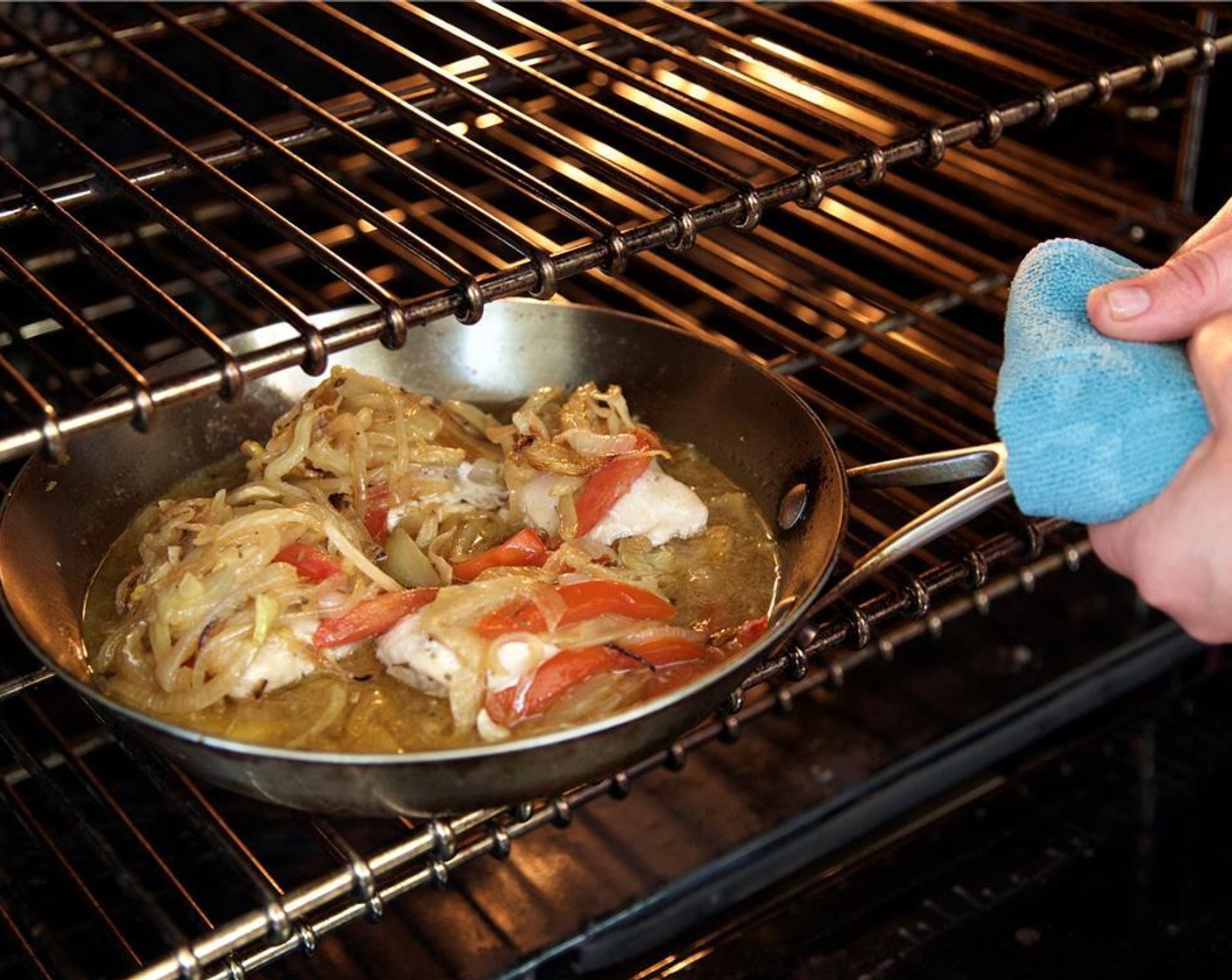 step 10 Place the pan in the oven and cook for six to seven minutes. Remove from oven and keep warm until plating.