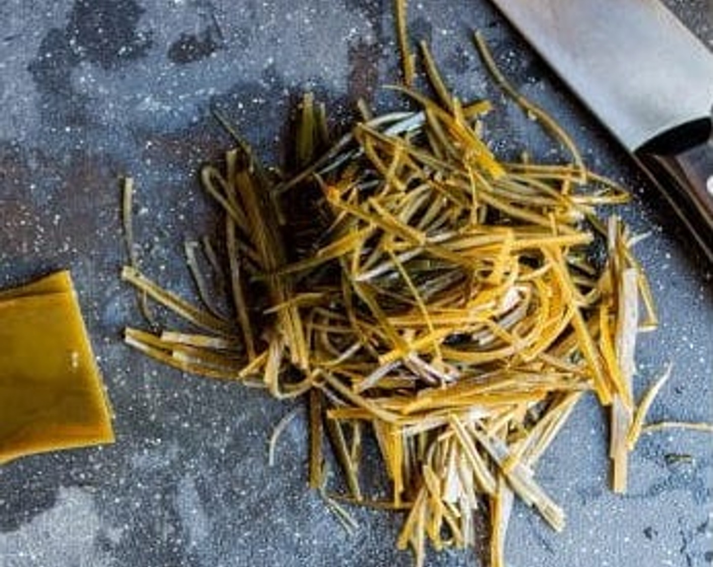 step 1 Cut the Kombu (2/3 cup) into 1-2mm thin strips. If the kombu strips are slimy, you can rinse them in hot water.