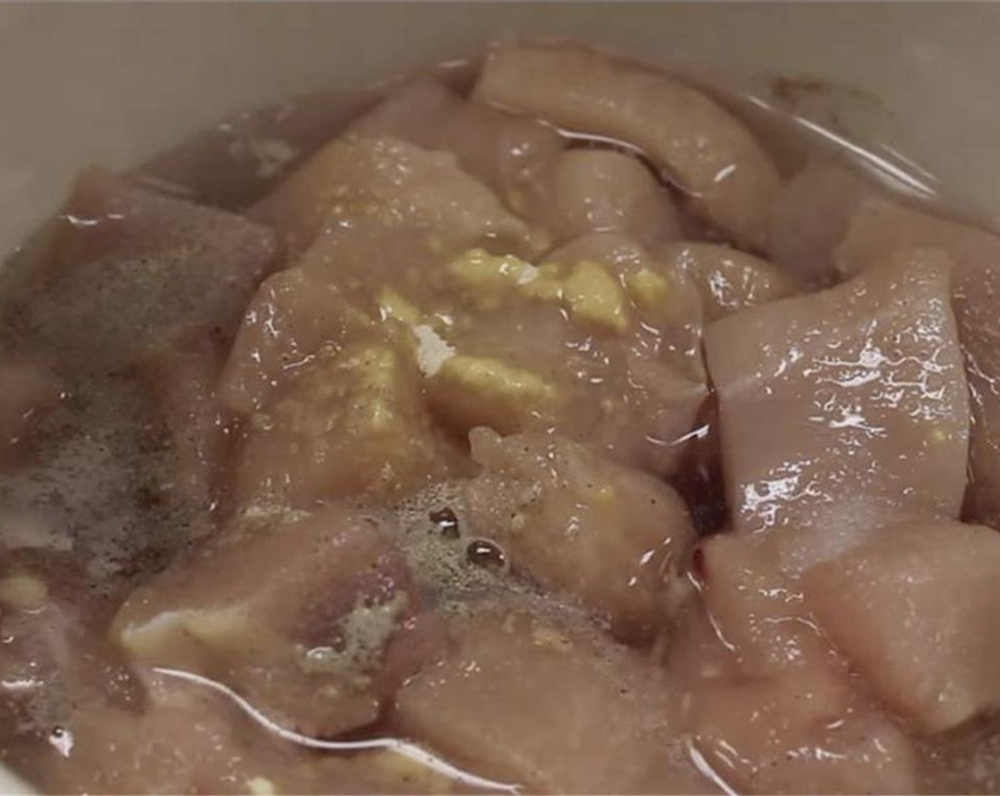 step 3 In a bowl, marinate the chicken with Salt (1/2 tsp), Simply Organic Garlic Powder (1/2 tsp), Ground White Pepper (1/8 tsp) and Water (3 Tbsp). Mix, cover and refrigerate for 15-20 minutes.