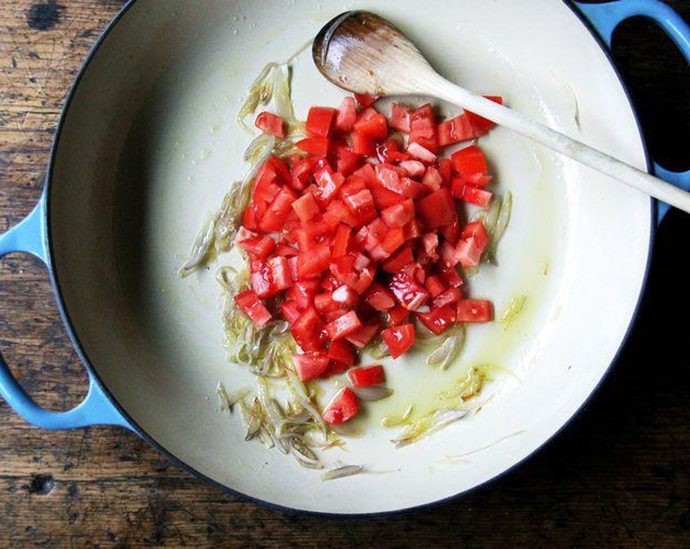 step 4 Add the Roma Tomatoes (2) to the pan and cook for 1 minute.