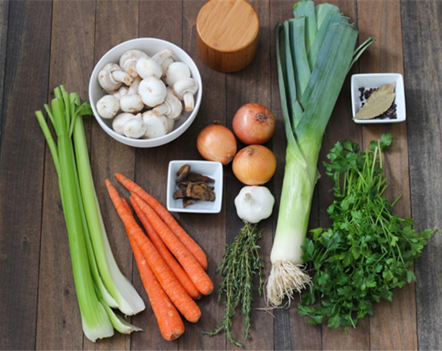 step 1 Wash the Celery (3 stalks), Carrots (3), Fresh Parsley (1 bunch), and Leeks (2) thoroughly to wash away the grit.