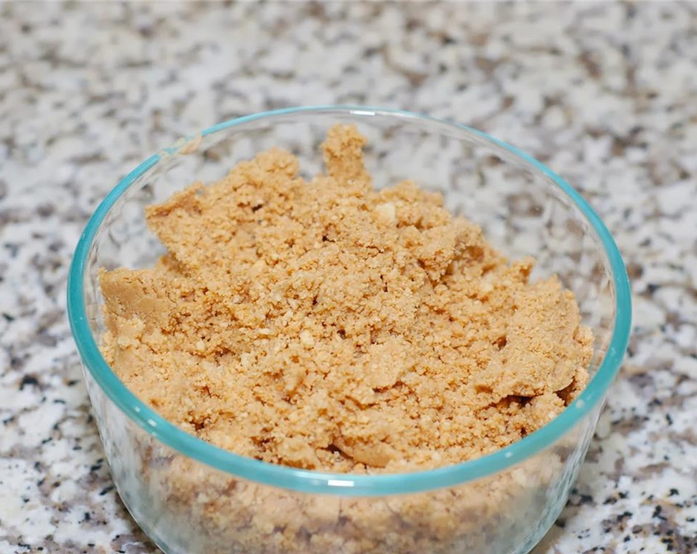 step 1 Grind the Oreo® Gingerbread Creme Sandwich Cookies (1 pckg) in a food processor.