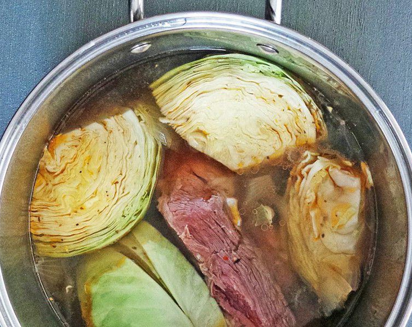 step 3 After three hours, add the rest of the onions, Green Cabbage (1 head), and other desired vegetables or potatoes.