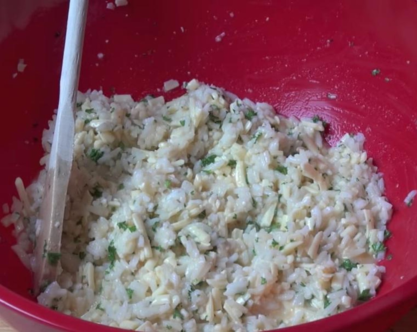 step 6 Add Long Grain White Rice (2 cups), Fresh Parsley (2 Tbsp), Cheddar Cheese (2 cups), and lightly beaten Eggs (4) to a large mixing bowl. Mix together until combined.