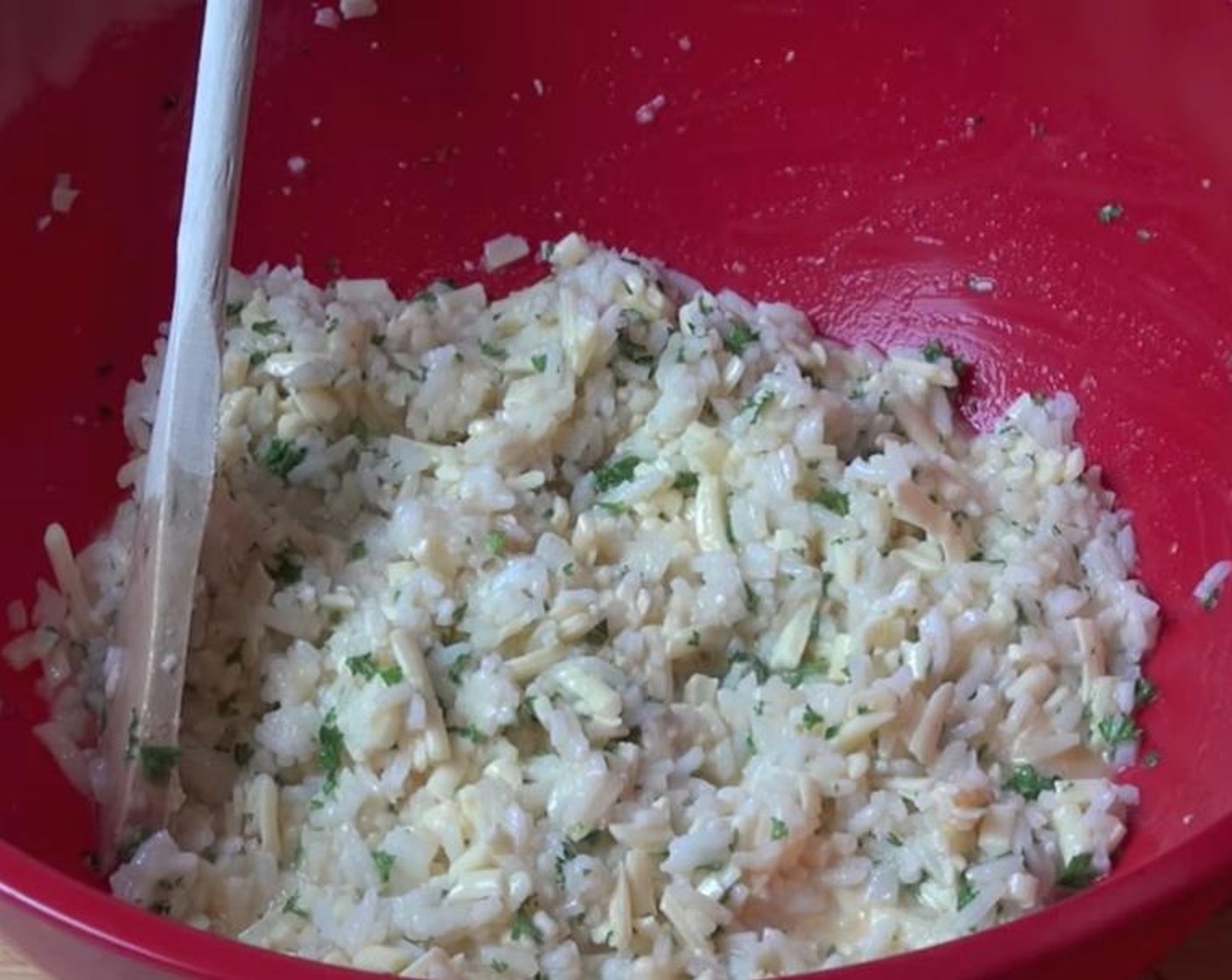 step 6 Add Long Grain White Rice (2 cups), Fresh Parsley (2 Tbsp), Cheddar Cheese (2 cups), and lightly beaten Eggland's Best Classic Eggs (4) to a large mixing bowl. Mix together until combined.