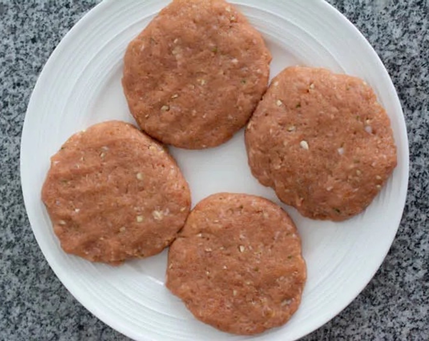 step 2 Divide the ground pork mixture into preferred equal parts and shape them into patties.