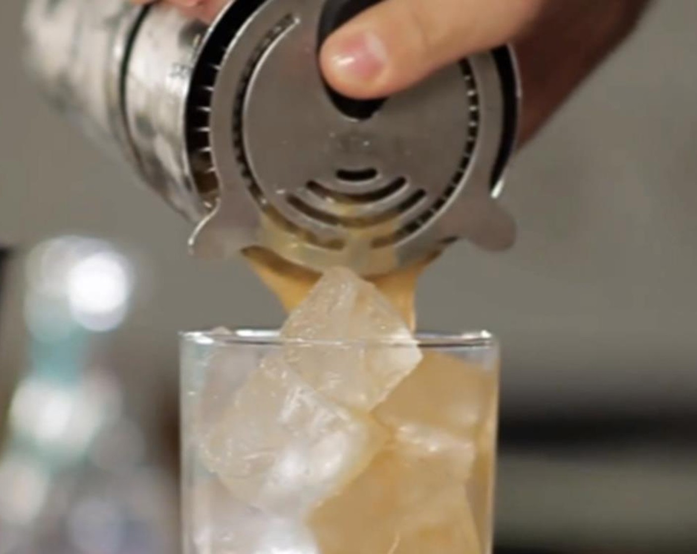 step 3 Fill a rocks glass with Ice (as needed). Using a strainer, pour the contents into the rock's glass.