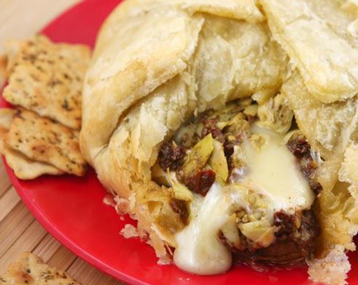 Baked Brie with Artichokes and Sun-Dried Tomatoes