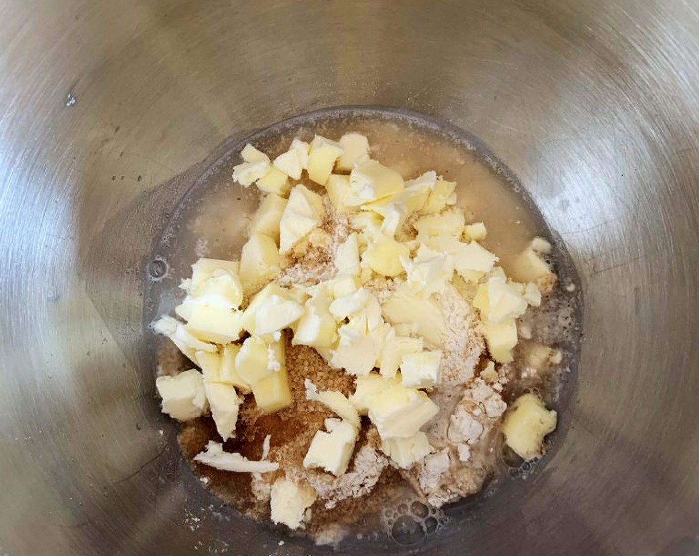 step 2 In a bowl of your electric mixer add the Spelt Flour (1 1/3 cups), Whole Wheat Flour (3/4 cup), Butter (1/3 cup), Cane Sugar (2 Tbsp), Water (2.5 oz), and Salt (1 pinch) to make the dough.