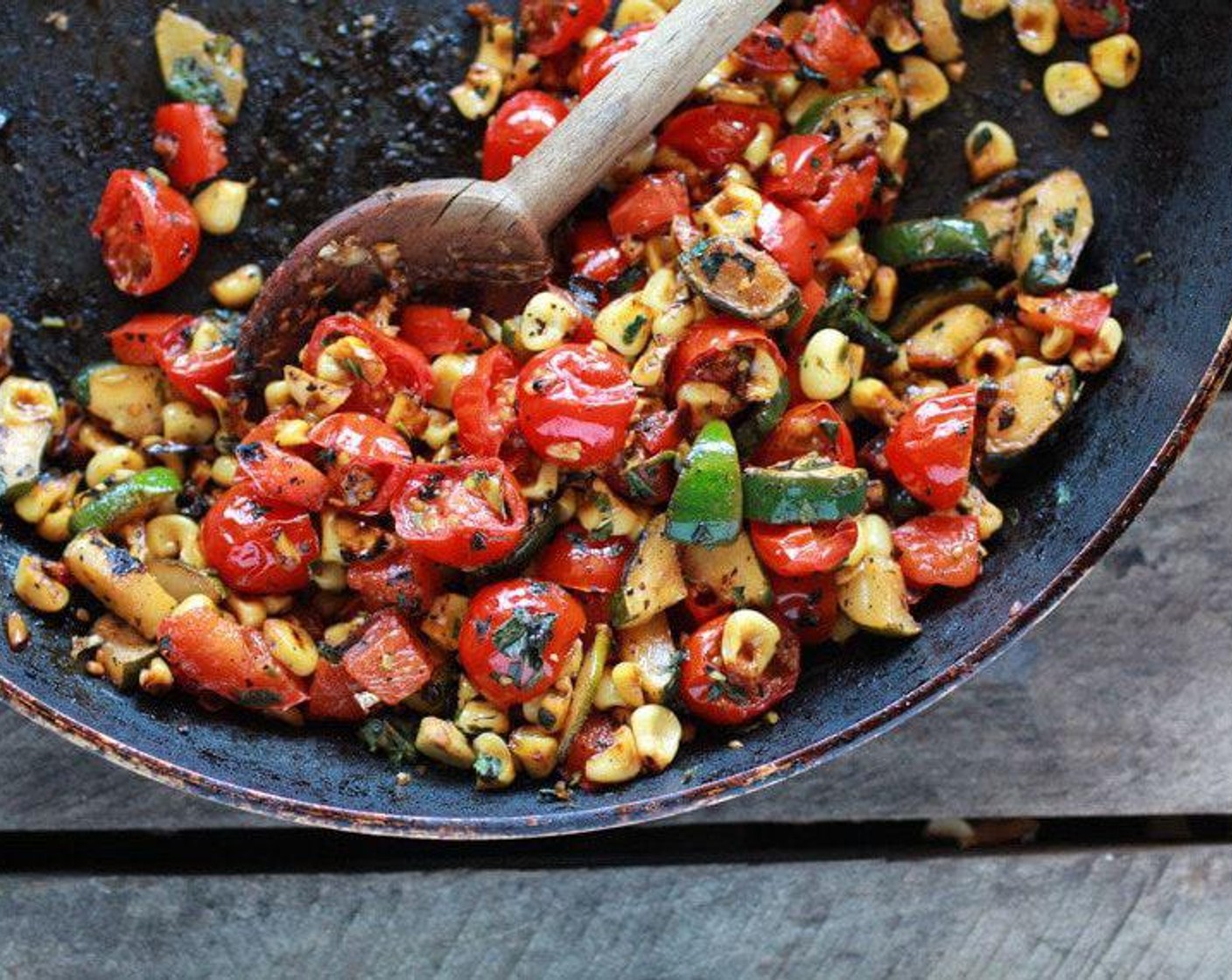 step 4 While the basil leaves are cooking heat a a skillet over medium high heat. Add Olive Oil (2 Tbsp) to pan. Add the Corn (1 ear), Red Chili Pepper (1), and Honey (2 tsp).