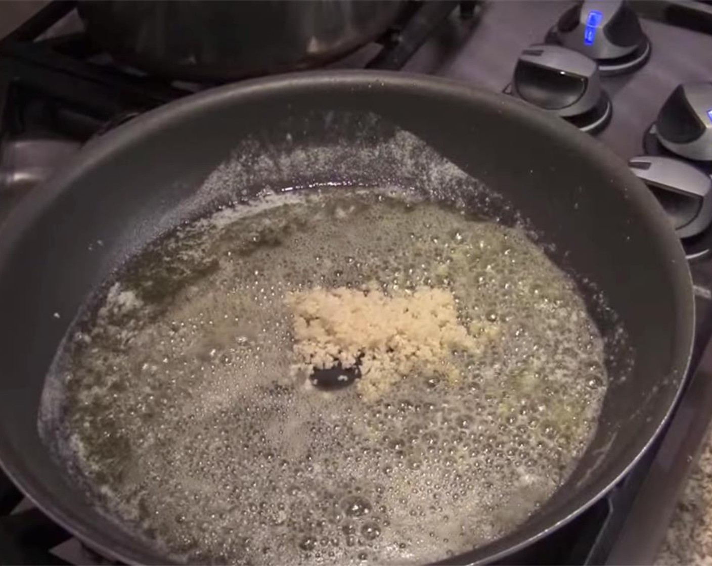 step 3 Heat your frying pan over medium heat, and add some Olive Oil (as needed), and Butter (1/2 cup). When the butter has melted and is bubbling, add the garlic, and cook for 1 minute.