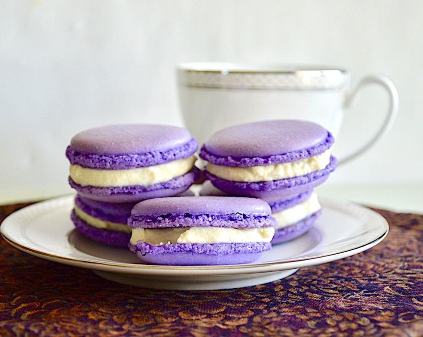 step 11 Assemble the macarons by spreading a heaping spoonful of the mascarpone honey filling on the flat side of one of the cookies. Then place another cookie of the same size on top and gently twist to make sure the filling spreads to the edge and the sandwich holds together. Chill before serving.