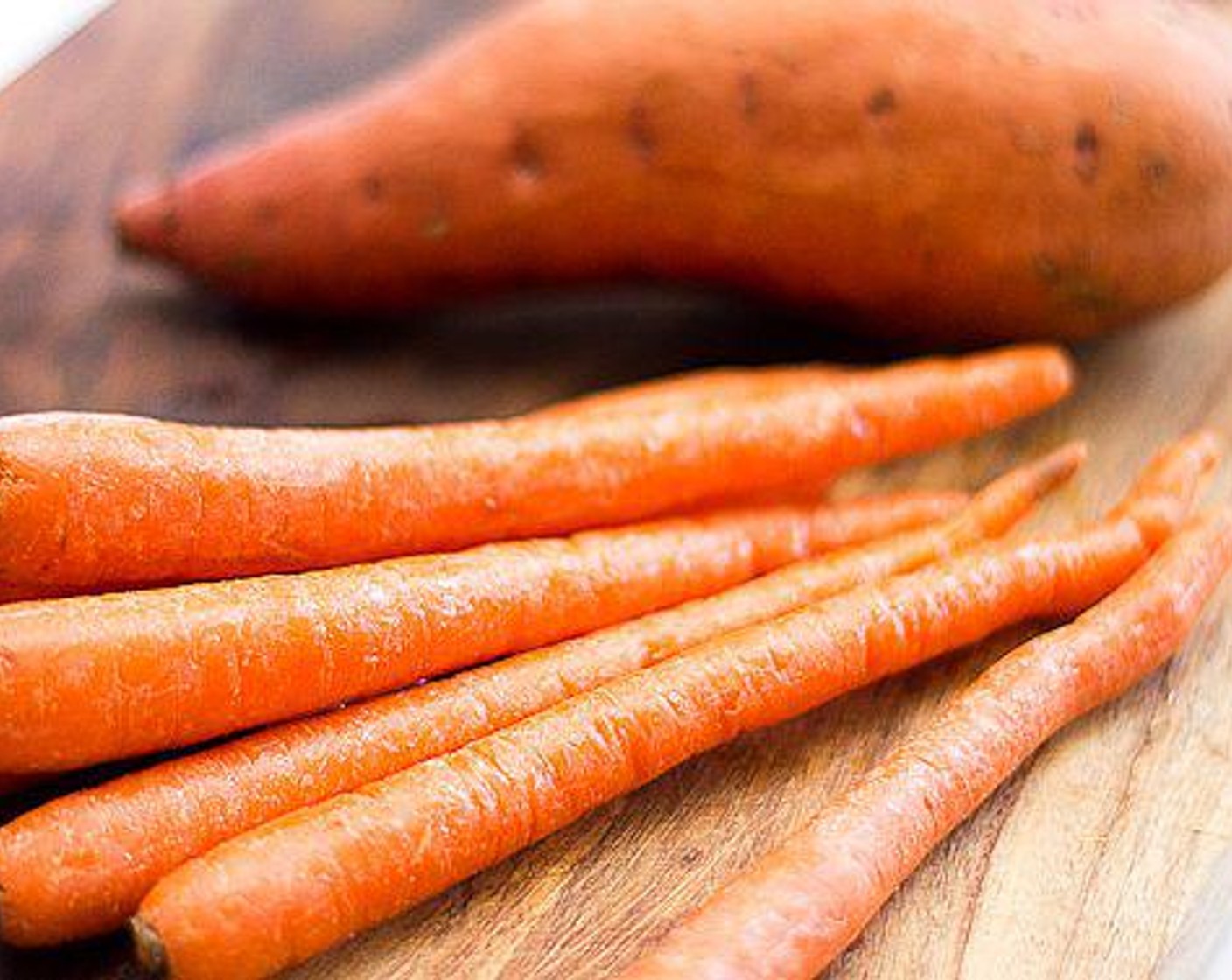 step 2 Wash and cut the Sweet Potato (1) and Carrots (6) into 1/2-inch wide batons.