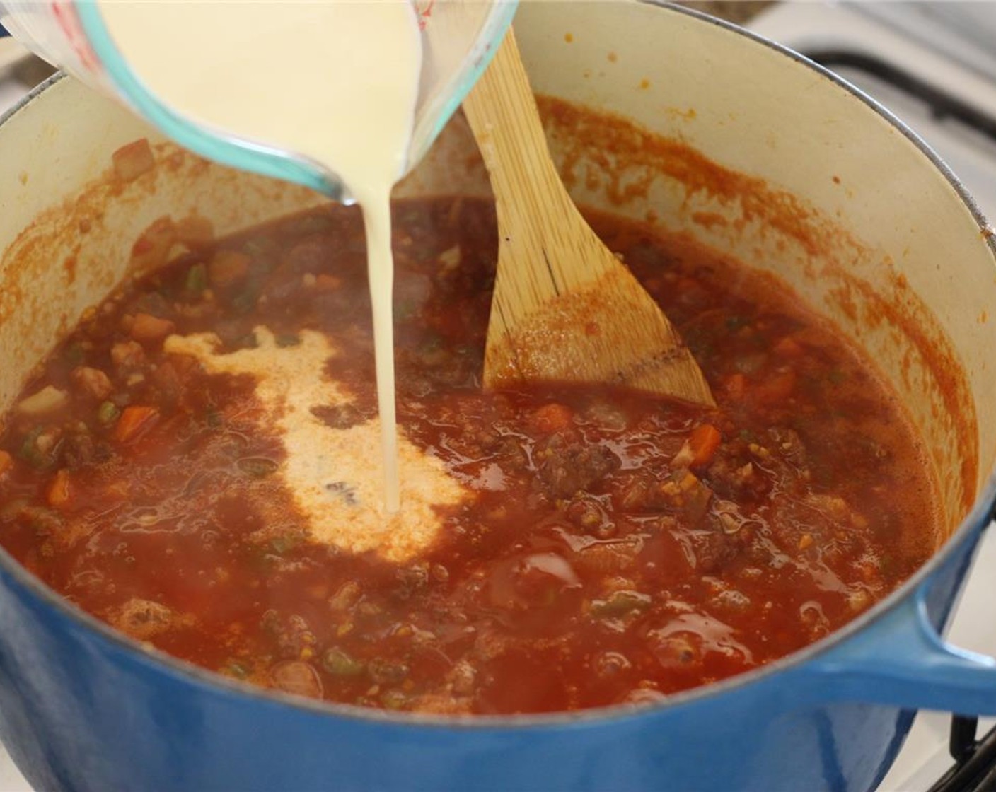 step 7 Stir in Heavy Cream (6 fl oz), then season with Salt (to taste) and Ground Black Pepper (to taste). Keep warm and prepare the pasta.