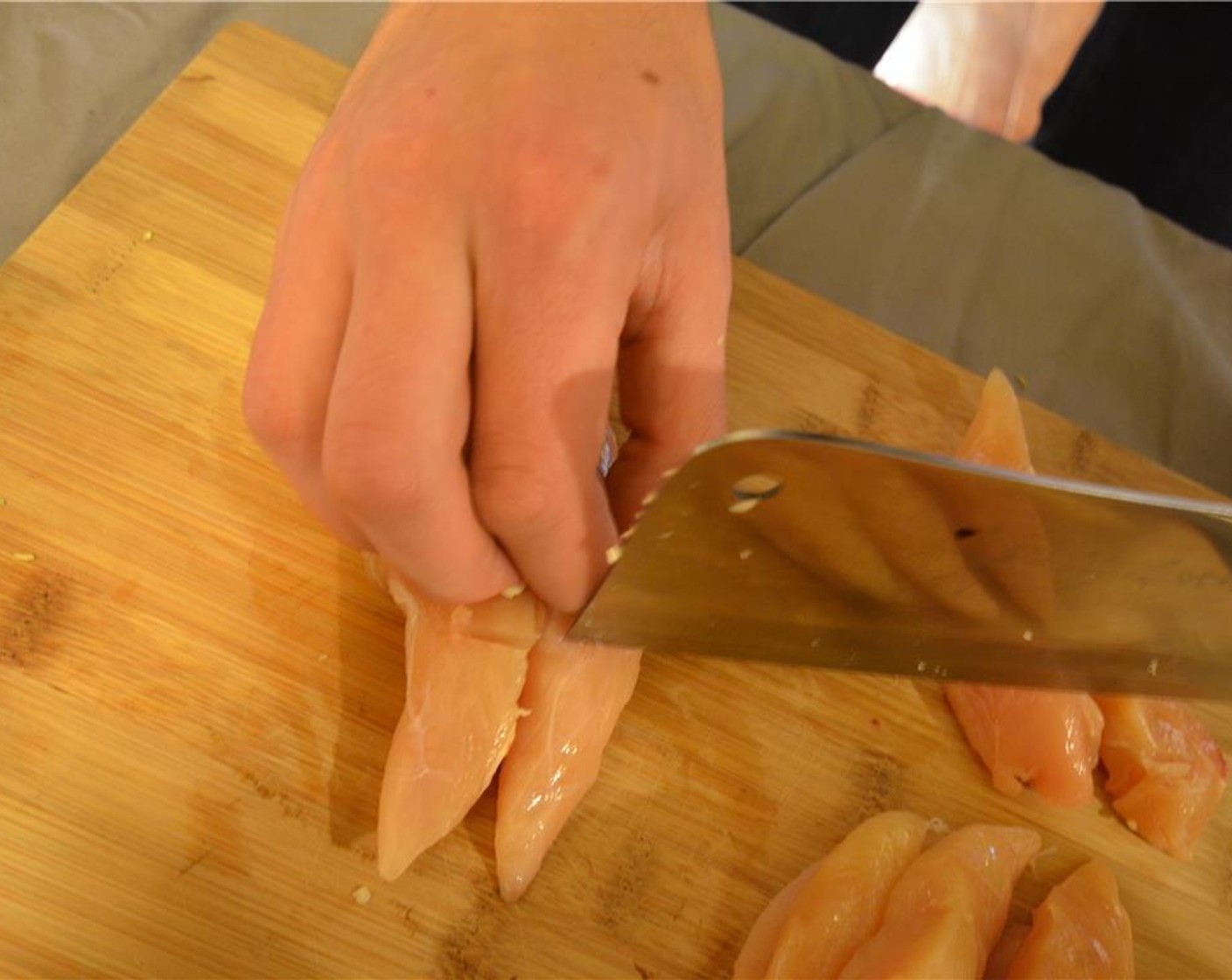step 3 Make parallel, shallow cuts in to the Chicken Tenders (1 lb). This allows the meat to absorb the marinade better.