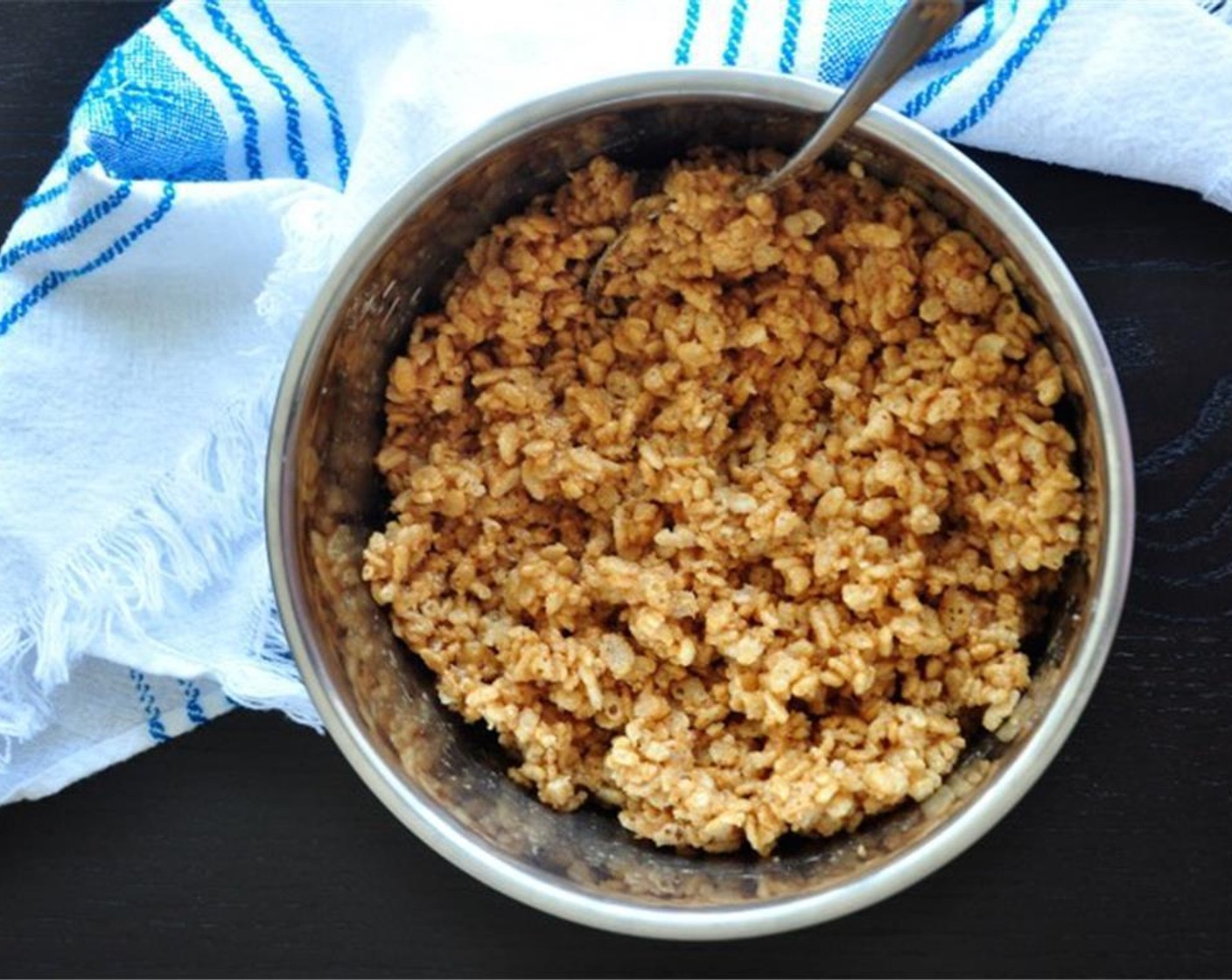 step 2 Add Rice Krispies® Cereal (4 cups) into the bowl and mix well.
