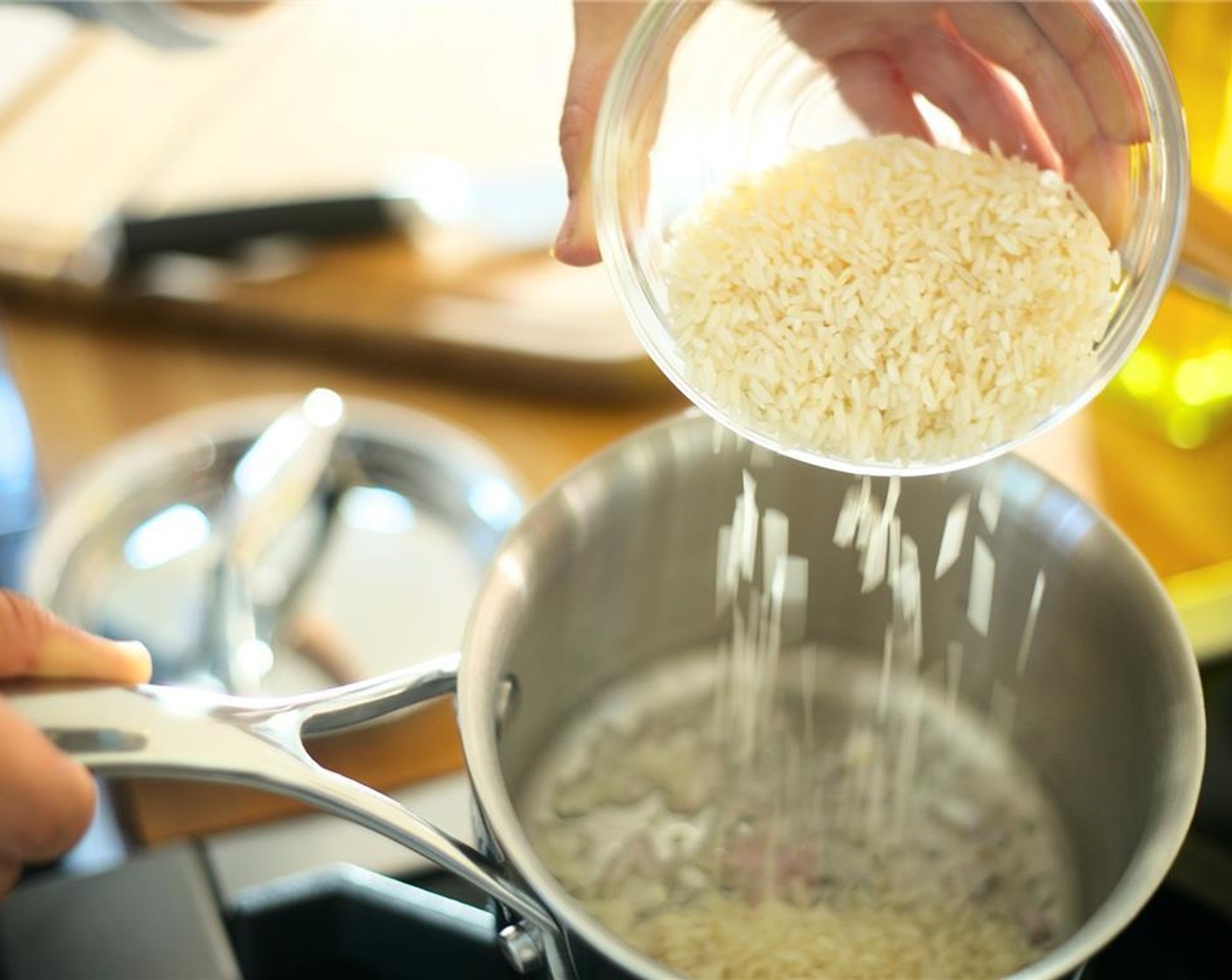 step 7 Add Basmati Rice (2/3 cup) and Ground Turmeric (1/4 tsp) and stir. Bring to a boil.