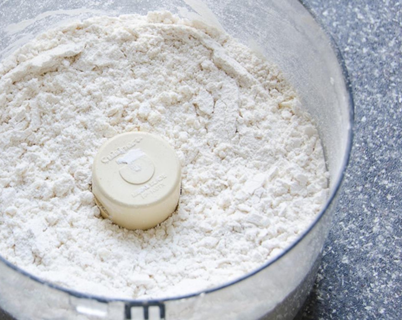 step 1 Cut the Unsalted Butter (1 cup) into chunks. Pulse the butter and All-Purpose Flour (4 1/2 cups) in the work bowl of a food processor until the mixture resembles coarse meal.