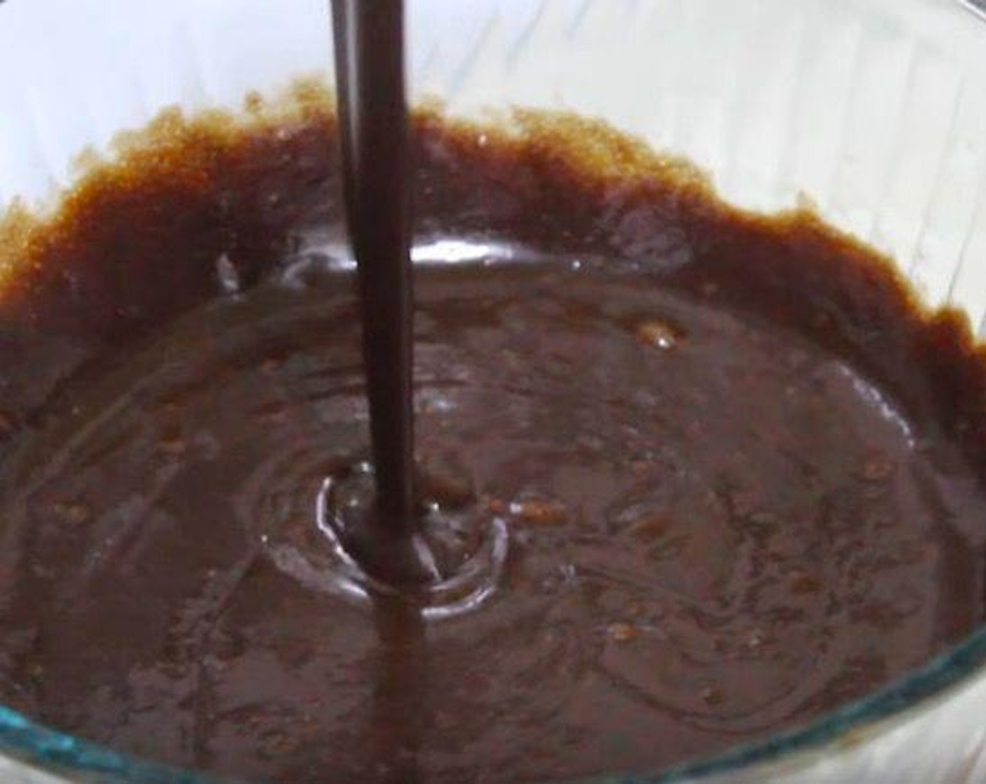 step 2 In a mixing jug, add Eggs (2) and Vanilla Extract (1 tsp). Whisk to combine. Add egg mixture to the chocolate mixture and whisk again until smooth.