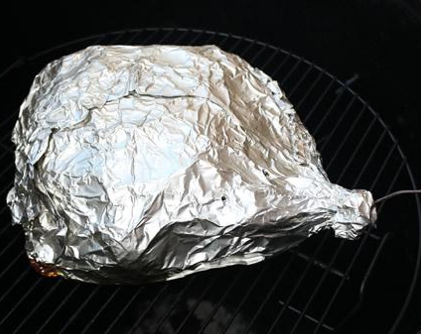 step 5 Wrap Boston Butt in 2-3 layers of aluminum foil. Apply a light coat of rub and baste before closing foil.