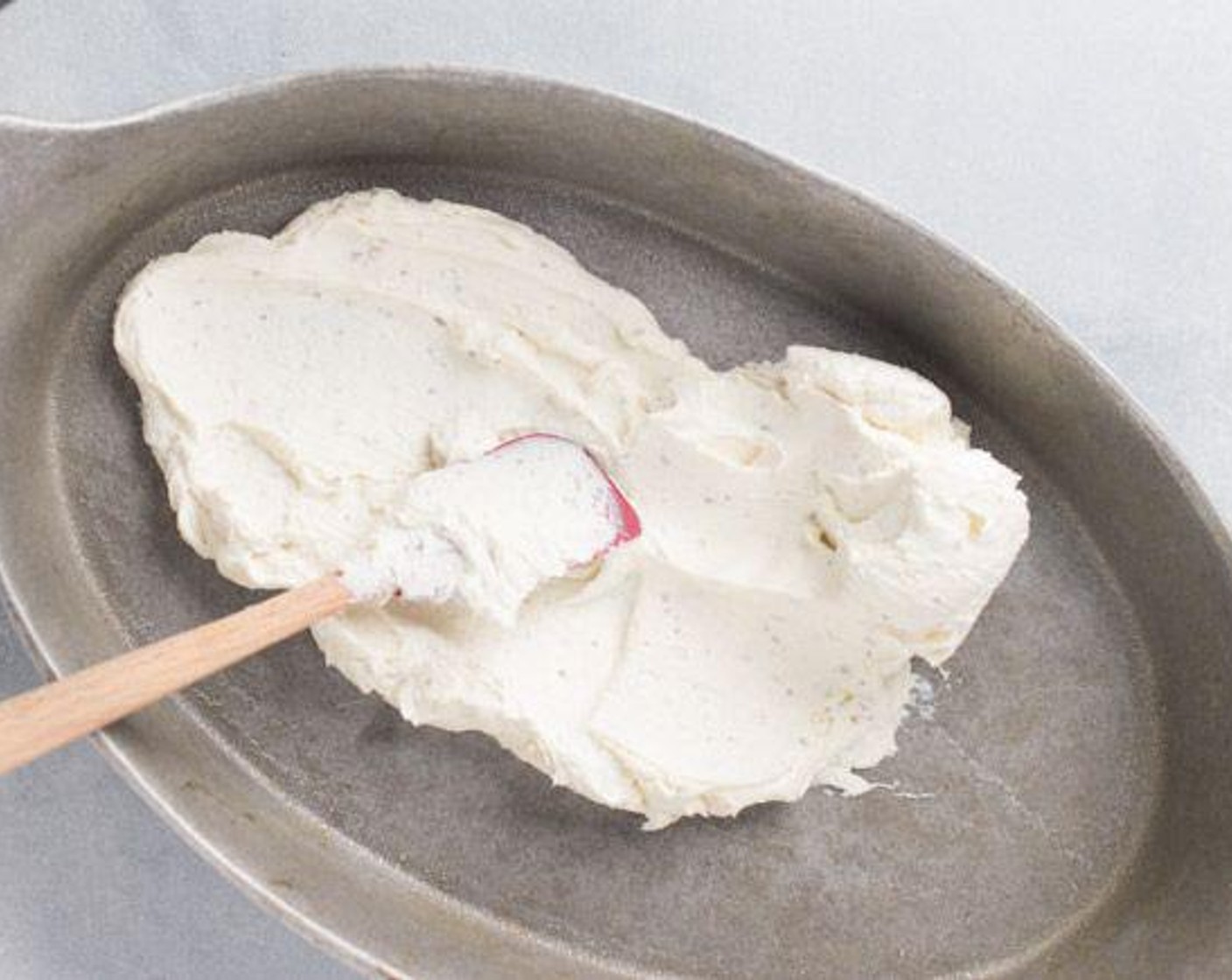 step 3 Spread cream cheese mixture into the bottom of at least a 2-quart baking dish (metal or glass).