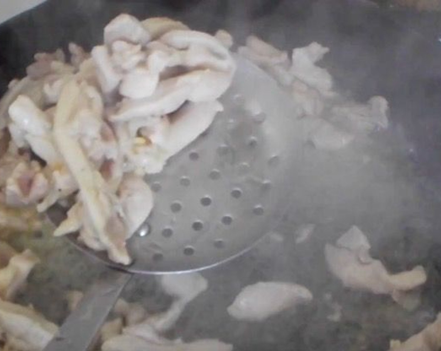 step 1 Into a hot pan, add Vegetable Oil (4 Tbsp). Add Boneless, Skinless Chicken Thighs (5). Season with Kosher Salt (1/2 tsp). Cook over medium heat for 4 minutes, then remove with a slotted spoon.
