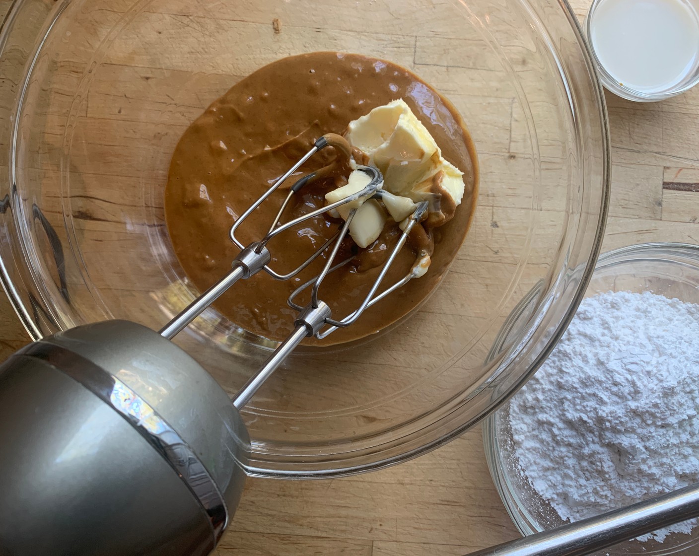 step 1 In a large mixing bowl, cream together the Creamy Peanut Butter (1 cup) and the Butter (1/3 cup) using an electric mixer, beat until well combined.