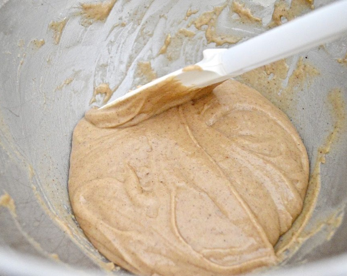 step 3 Then set up a stand mixer with the paddle attachment. Combine Milk (3 Tbsp), Vegetable Oil (2 Tbsp), Rose Water (1 Tbsp), juice and zest of the Lemon (1), and Egg (1) in its bowl and beat them together until fluffy.