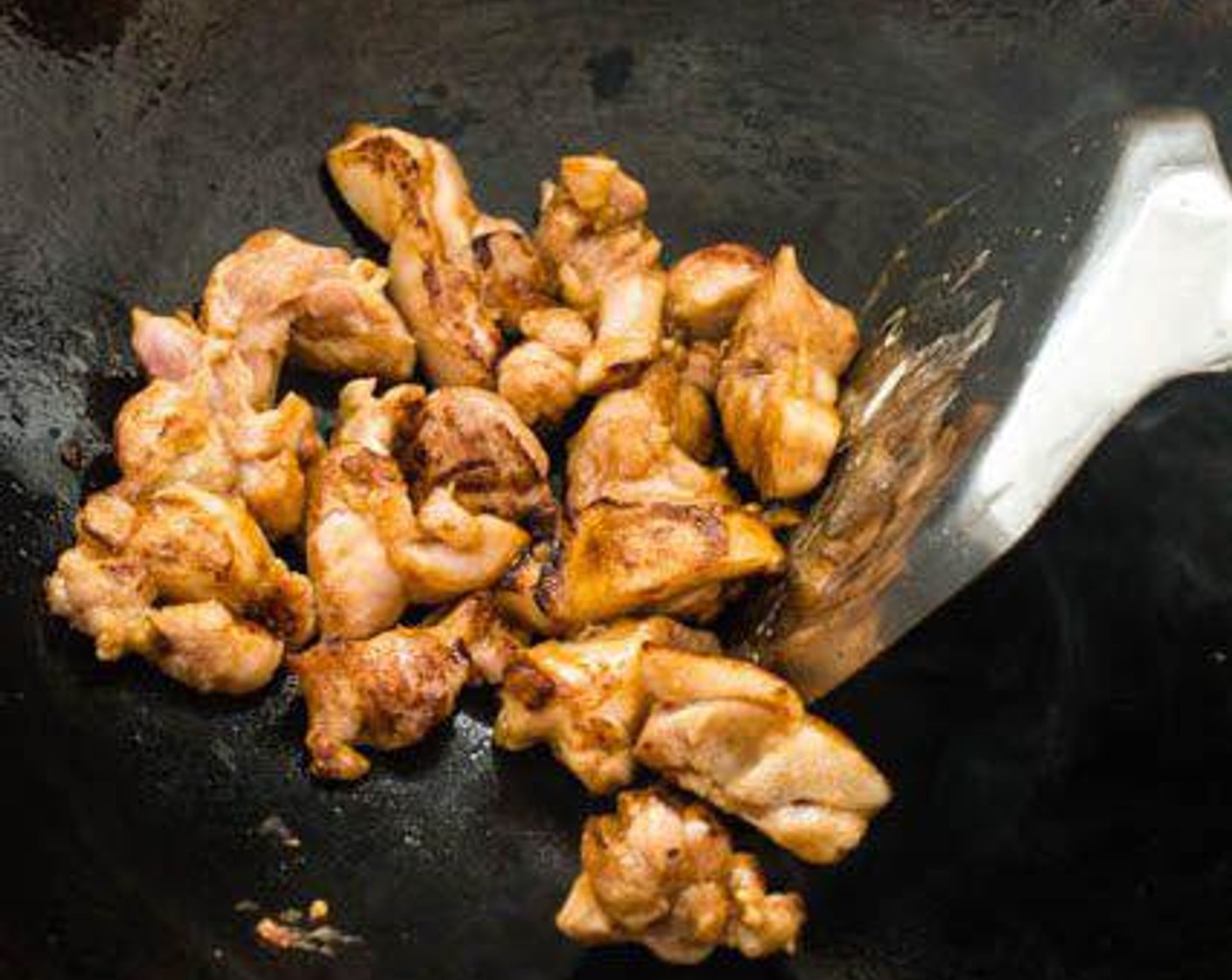 step 6 Heat Cooking Oil (1 Tbsp) in a wok over medium-high heat. Add the chicken and stir-fry until fully cooked. Remove from wok and set aside.