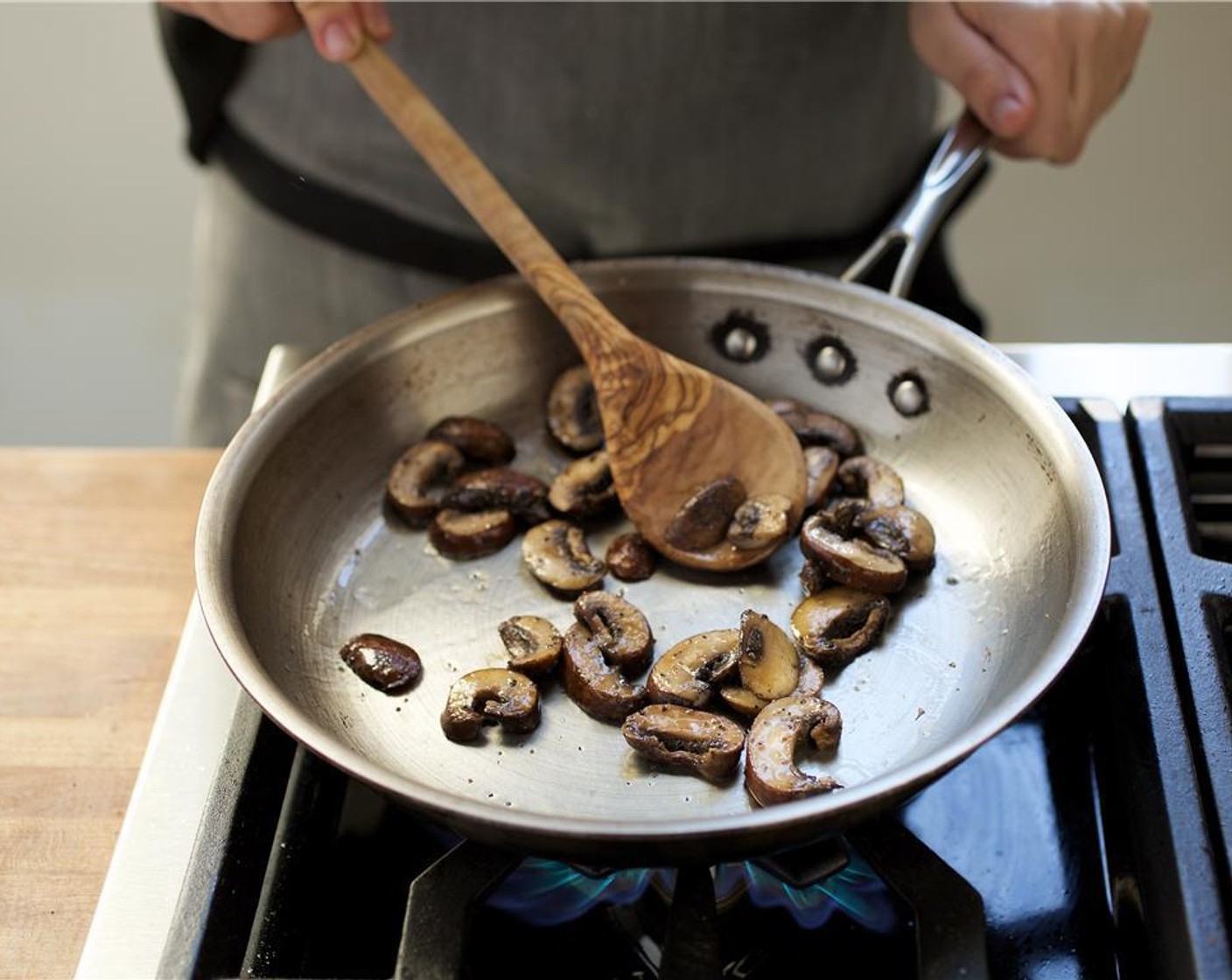 step 6 When hot, add the mushrooms and add Salt (1/4 tsp) and Ground Black Pepper (1/4 tsp). Cook for 3 minutes, stirring occasionally. Remove mushrooms from pan and set aside.