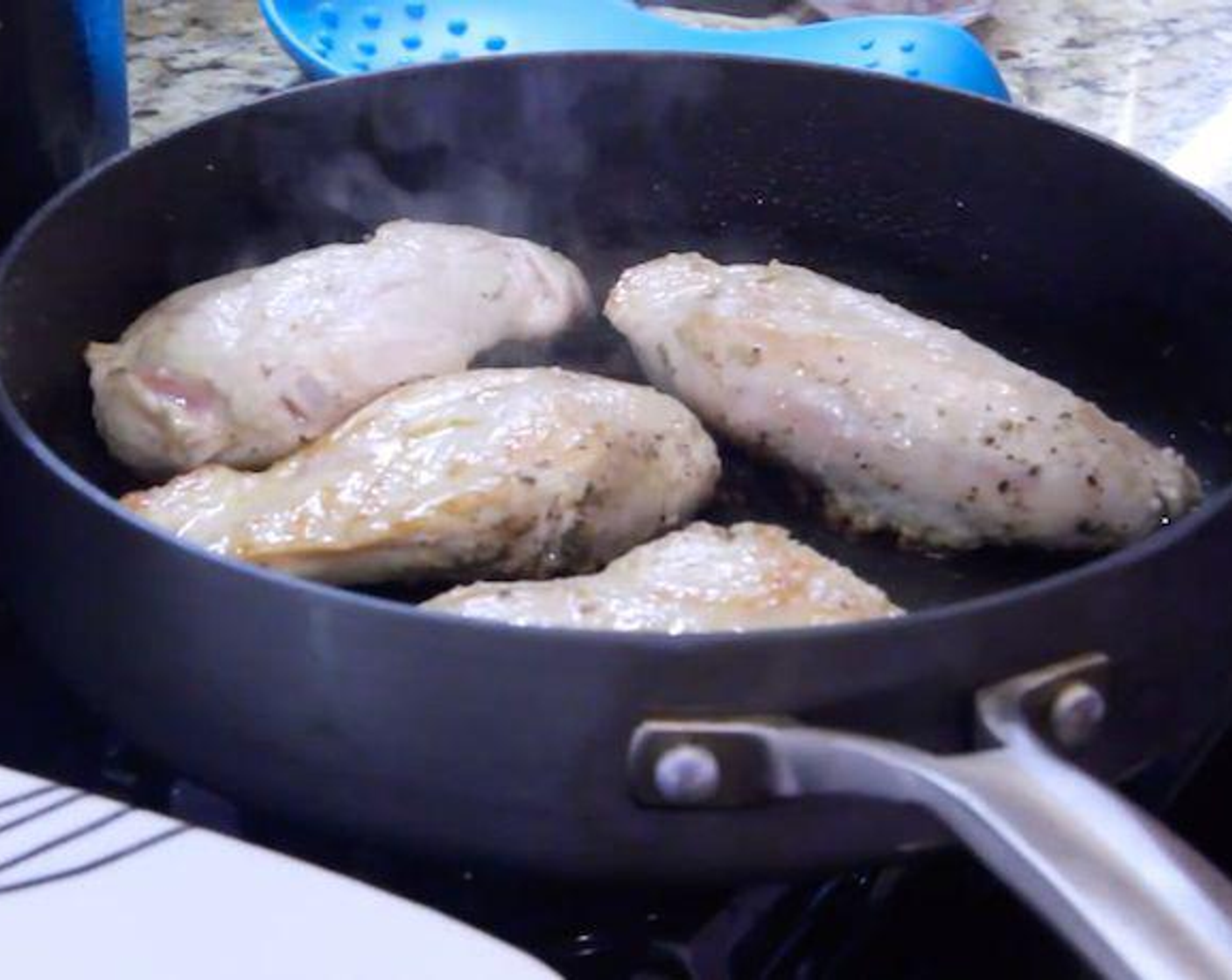 step 5 Heat a drizzle of Olive Oil (as needed) in a large pan over medium-high heat. Pat Boneless, Skinless Chicken Breasts (4) dry with a paper towel, then season all over with Salt (to taste) and Ground Black Pepper (to taste). Add to pan and cook until no longer pink in the center, 4-5 minutes per side. Remove from pan and set aside.