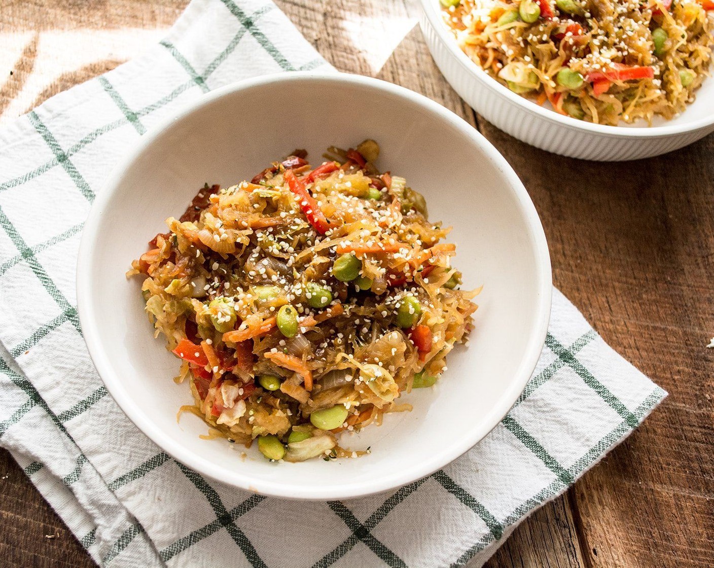 step 7 Stir to combine, dish into two bowls, cover with Hemp Hearts (to taste) and serve! Enjoy!