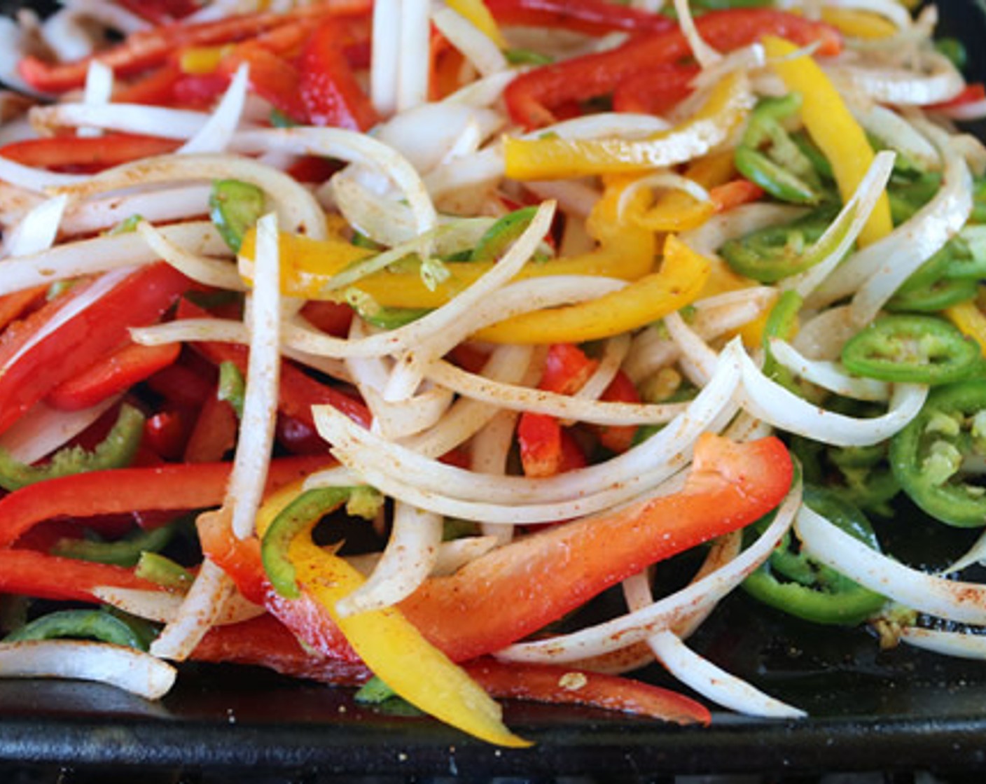 step 9 Place flat cast iron skillet directly on cooking grate and add Olive Oil (2 Tbsp). Add vegetables and sauté until tender, about 10 minutes.