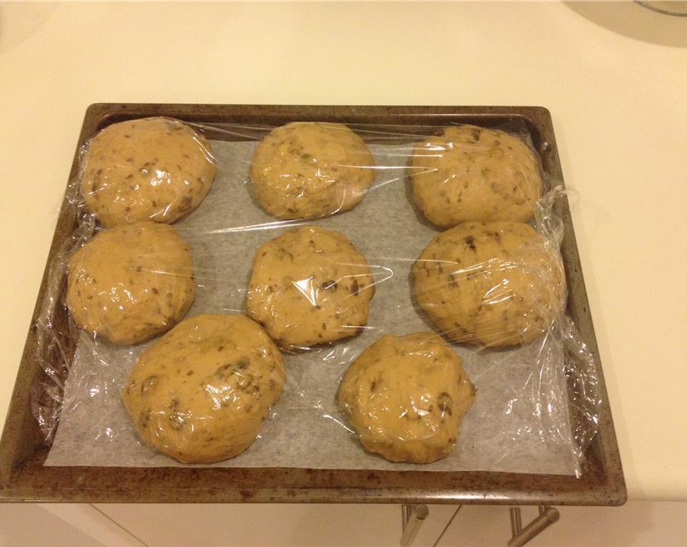 step 5 Form each portion into a roll sized shape and place onto a floured baking pan. Cover with cling wrap and rest for another 45-60 minutes or until the rolls double in size.