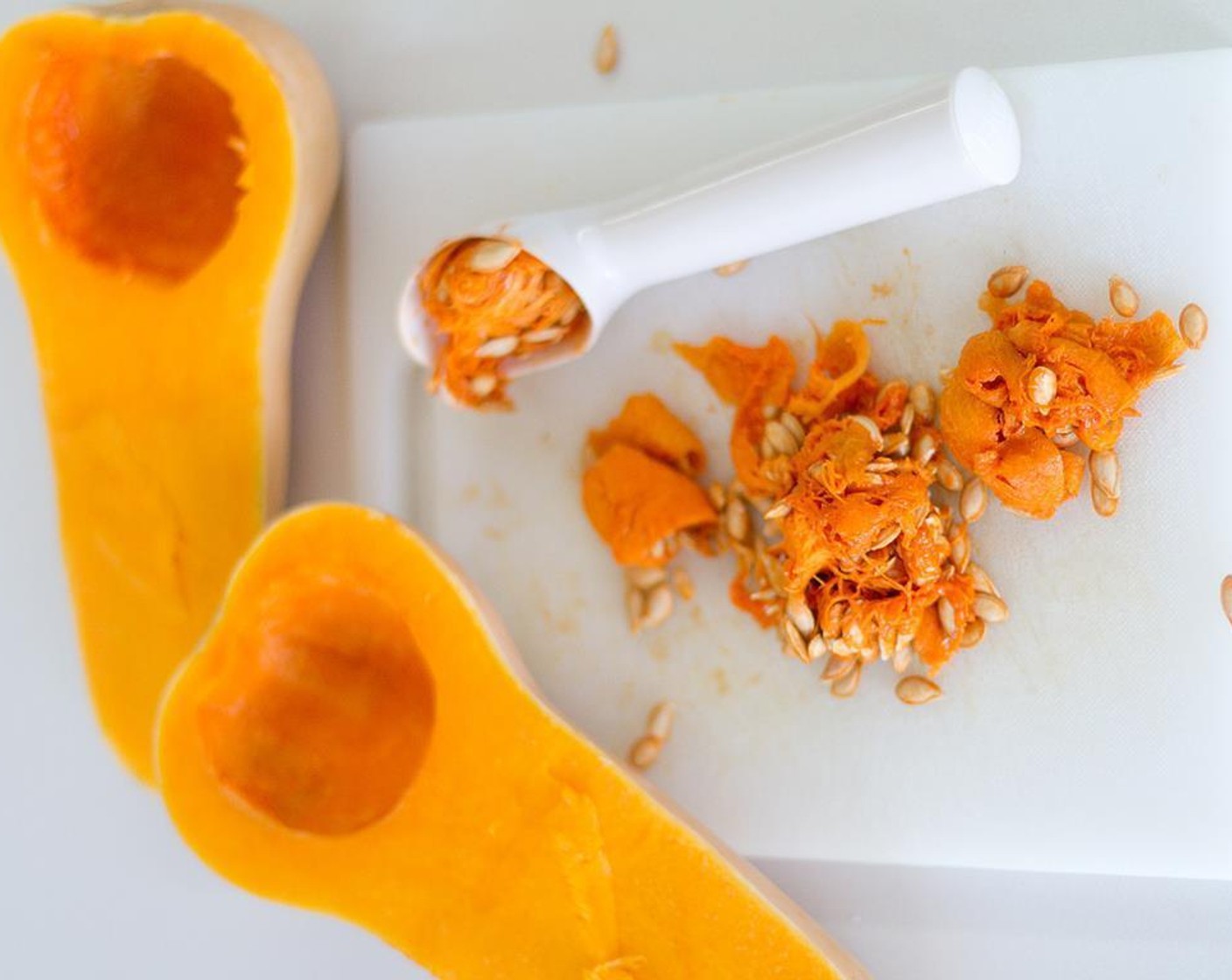 step 2 Halve the Butternut Squash (1), lengthwise; scoop out the seeds and discard.