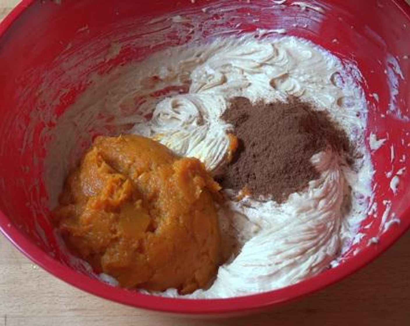 step 5 Into the cheese mixture, add in the Canned Pumpkin Purée (2 cups), Vanilla Extract (1 tsp), and Pumpkin Pie Spice (1 Tbsp). Mix everything together.
