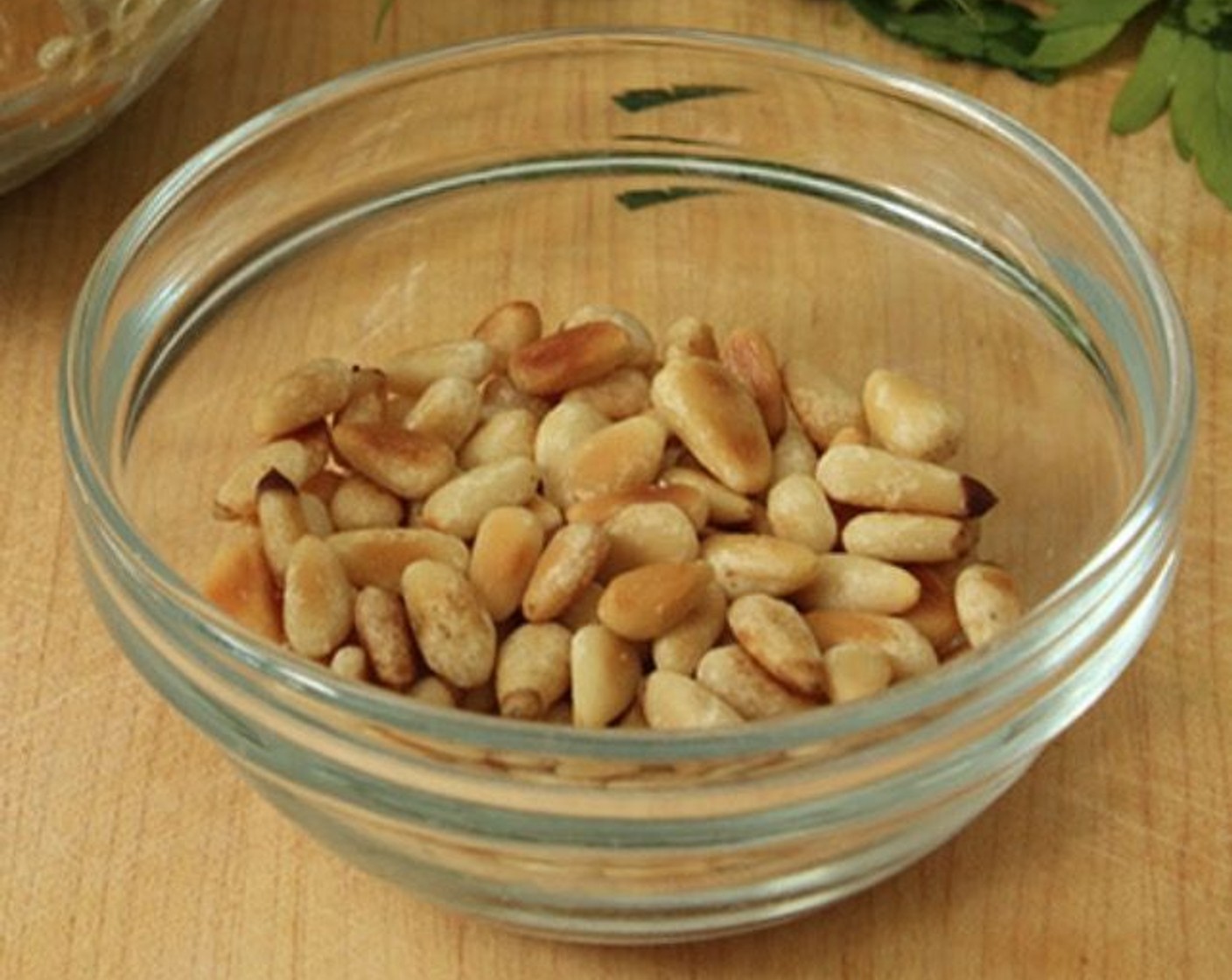 step 6 To toast Pine Nuts (2 Tbsp), place them in a small sauté pan and cook over medium heat for 3-5 minutes, tossing very often, until lightly browned and toasted.