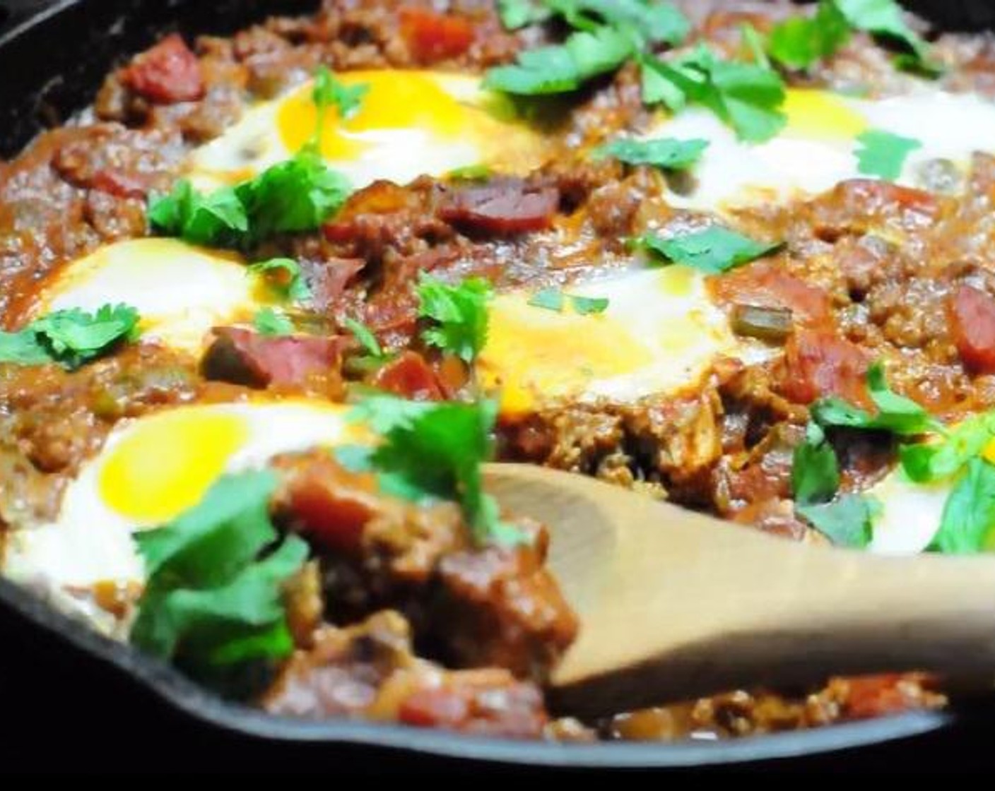 step 5 Transfer the shakshuka to oven and bake for 7 minutes, or until the egg white is set.