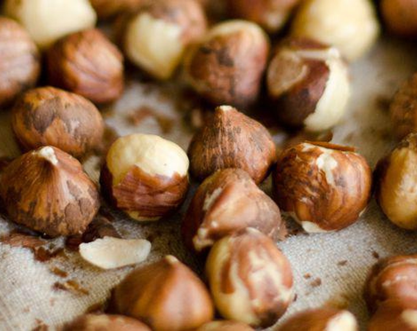 step 1 Roast the Hazelnuts (1 cup) at 350 degrees F (180 degrees C) for 20 minutes. Transfer onto a kitchen towel and roll with your hands to remove skins.