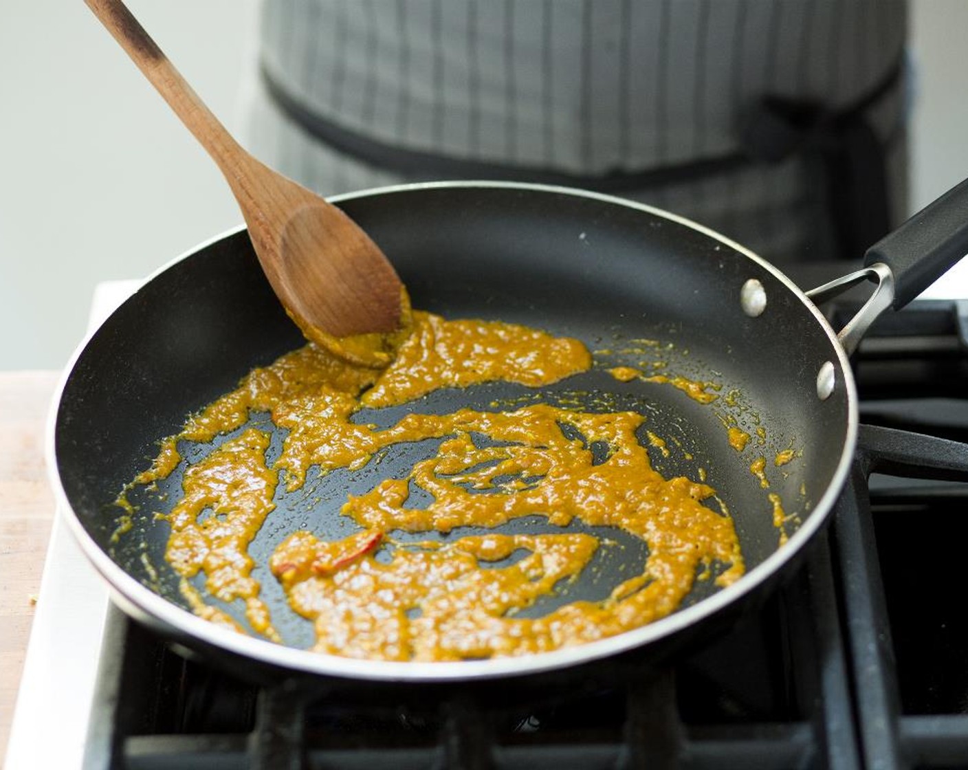 step 7 To same hot pan, add only 1/4 cup of the Coconut Milk (1 can), Ground Turmeric (1 tsp), Kosher Salt (1 tsp), Curry Powder (1 tsp), Sambal (1 tsp), Brown Sugar (1 Tbsp), Dried Chili Pepper (1), ginger and garlic and cook for 1 minute.