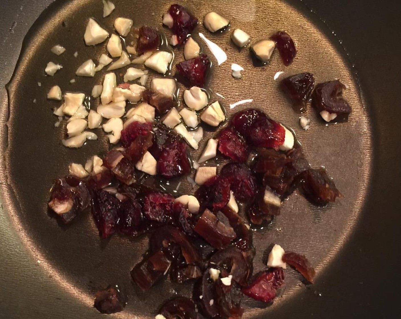 step 2 Heat Ghee (2 Tbsp) in a pan. Add your favorite Dried Fruits (to taste) and Assorted Nuts (to taste) sauté until color changes.