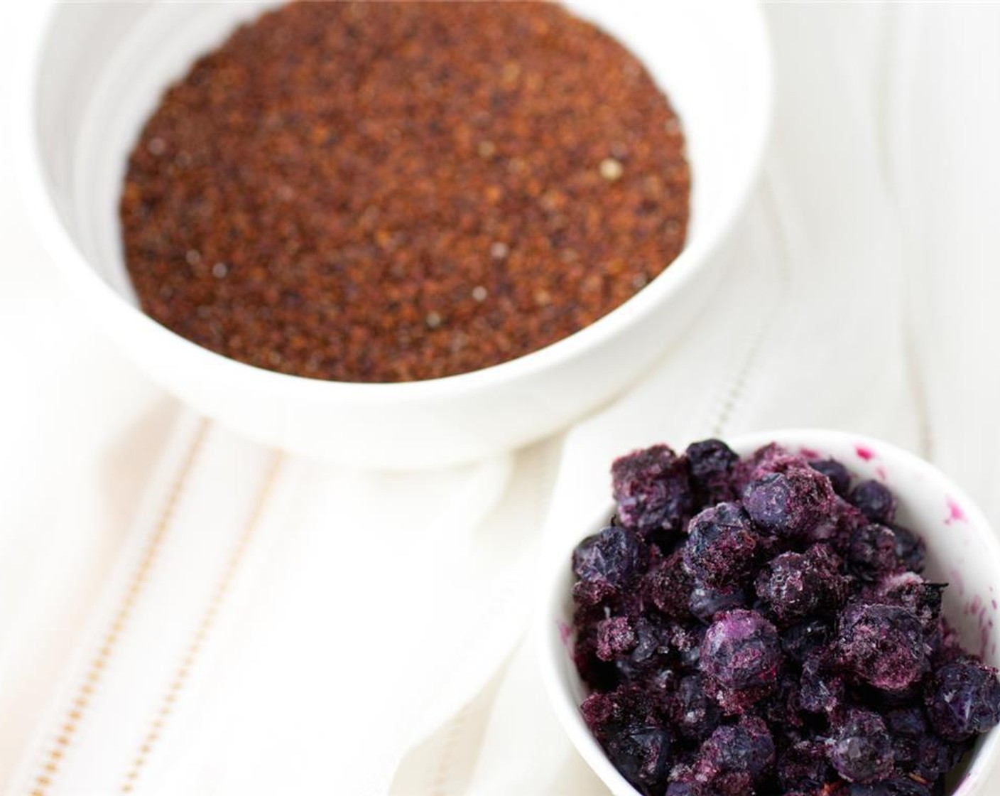 step 1 In a medium saucepan, combine Red Quinoa (1/2 cup), Non-Dairy Milk (1 1/2 cups), Ground Cinnamon (1 tsp), Vanilla Extract (1/2 tsp), Kosher Salt (1/4 tsp), Maple Syrup (1 1/2 Tbsp), Ground Nutmeg (to taste), and Chai Latte Powder (1 tsp).